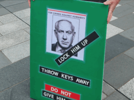 Israeli torture, abuse of Palestinian prisoners, death penalty law – yet NZ remains silent Israeli Prime Minister Benjamin Netanyahu portrayed on a placard at a New Zealand pro-Palestine rally