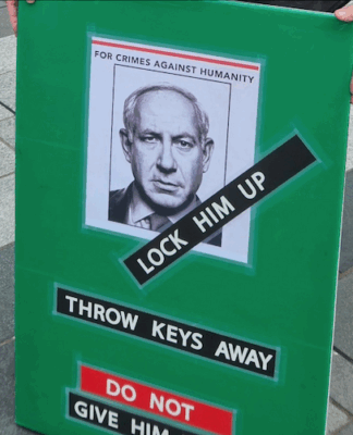 Israeli torture, abuse of Palestinian prisoners, death penalty law – yet NZ remains silent Israeli Prime Minister Benjamin Netanyahu portrayed on a placard at a New Zealand pro-Palestine rally