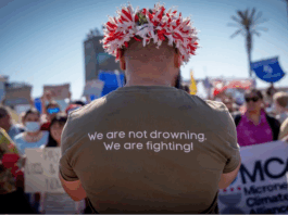 Pacific youth climate activist at a demonstration at COP27 in 2022