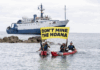 Cook Island activists peacefully confront the Nautilus at Rarotonga port last month, holding banners proclaiming "Don’t Mine The Moana"