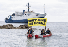 Cook Island activists peacefully confront the Nautilus at Rarotonga port last month, holding banners proclaiming "Don’t Mine The Moana"