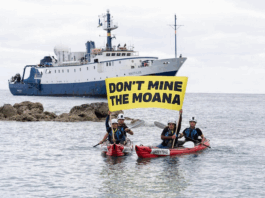 Cook Island activists peacefully confront the Nautilus at Rarotonga port last month, holding banners proclaiming "Don’t Mine The Moana"