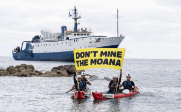 Cook Island activists peacefully confront the Nautilus at Rarotonga port last month, holding banners proclaiming "Don’t Mine The Moana"