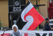 Australian author says shadow Gaza transit scheme company is operating ‘disaster capitalism’ Pro-Palestinian activist Lamees Elthiny speaking to protesters in Auckland