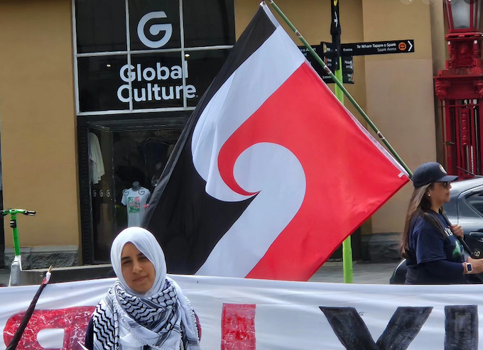 Lamees Elthiny APR 680wide Timo rangatriatanga flag APR 680wide Pro-Palestinian activist Lamees Elthiny speaking to protesters in Auckland