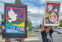 "Let Gaza Live" says a placard in a New Zealand protest against the Israeli genocide and environmental devastation in West Auckland