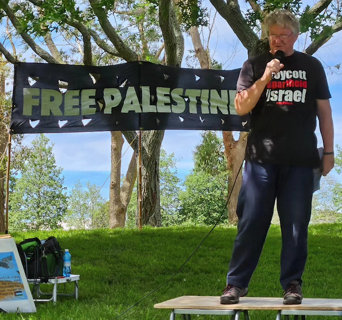 PSNA secretary Neil Scott speaking at today's Te Pai Park rally