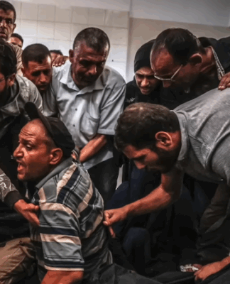 Palestinians mourn their relatives who were killed by the Israeli military in air strikes in spite of the Gaza ceasefire on 19 October 2025