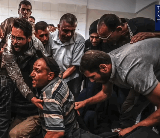 Palestinians mourn their relatives who were killed by the Israeli military in air strikes in spite of the Gaza ceasefire on 19 October 2025