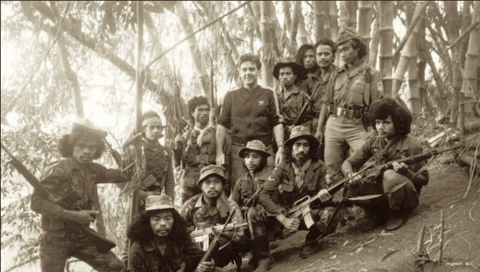 Australian journalist Roger Domm with Falintil resistance fighters in Timor-Leste in 1990