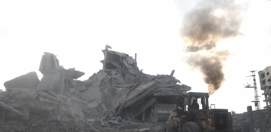 Gaza ‘ceasefire’ simply means that Israel can do whatever it wants. We can’t. Palestinians clear rubble to search for survivors in a Gaza house