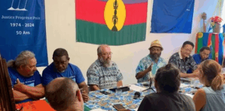 Pro-independence Progressist Union in Melanesia (UPM) leader Victor Tutugoro (centre with hat) and the party’s political bureau at a media conference this week in Nouméa