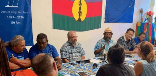 Pro-independence Progressist Union in Melanesia (UPM) leader Victor Tutugoro (centre with hat) and the party’s political bureau at a media conference this week in Nouméa