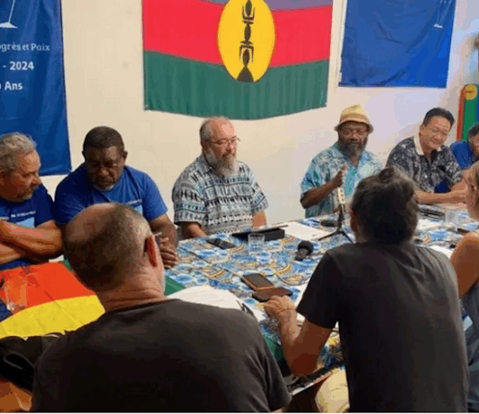 Pro-independence Progressist Union in Melanesia (UPM) leader Victor Tutugoro (centre with hat) and the party’s political bureau at a media conference this week in Nouméa