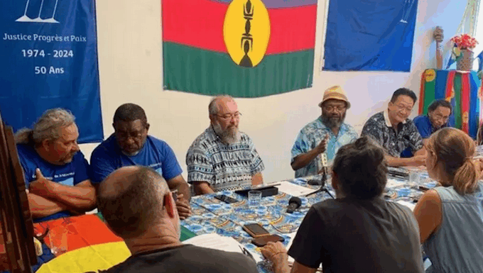 Pro-independence Progressist Union in Melanesia (UPM) leader Victor Tutugoro (centre with hat) and the party’s political bureau at a media conference this week in Nouméa
