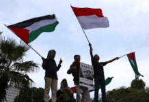 Indonesians demonstrate in front of the US Embassy in Jakarta to show solidarity with Palestinians on the second anniversary of the war on Gaza on 7 October 2025