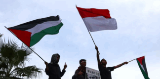 Indonesians demonstrate in front of the US Embassy in Jakarta to show solidarity with Palestinians on the second anniversary of the war on Gaza on 7 October 2025