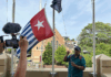 West Papuan supporters raise the Morning Star flag in Leichhardt, Sydney, today as protesters around the world mark the 1 December 1961 "independence" flag-flying day. Image: AWPA