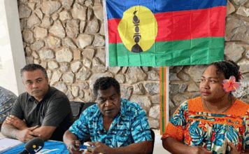 FLNKS president Christian Tein (centre) with Arnaud Chollet-Leakava and Laurie Humuni