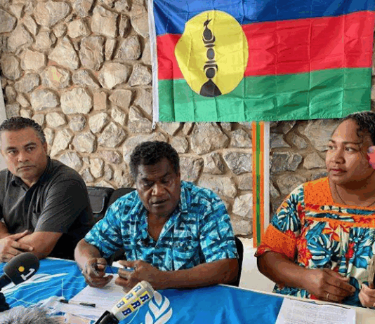 FLNKS president Christian Tein (centre) with Arnaud Chollet-Leakava and Laurie Humuni