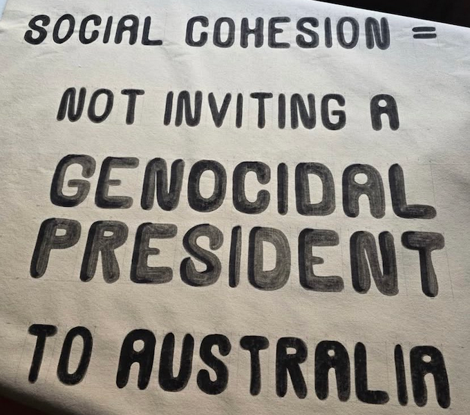 A poster condemning Australia's invitation to Israeli President Isaac Herzog next month