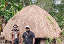 The author, Laurens Ikinia, with a well-preserved mummy from the Hubula tribe in Wamena