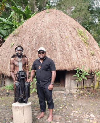 Jakarta at crossroads – can President Prabowo connect with Papuan hearts? The author, Laurens Ikinia, with a well-preserved mummy from the Hubula tribe in Wamena
