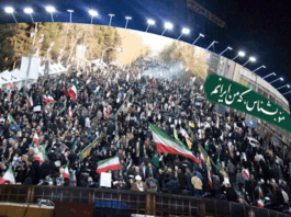 Tehran mural . . . a massive Vali Asr Square image of the pro-government national protests
