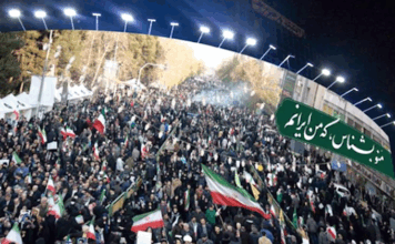 Tehran mural . . . a massive Vali Asr Square image of the pro-government national protests