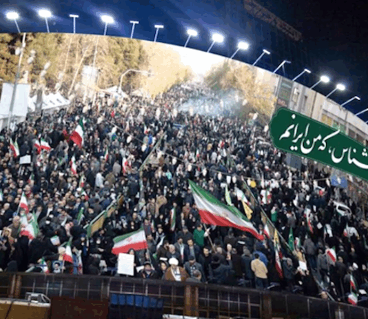 Tehran mural . . . a massive Vali Asr Square image of the pro-government national protests