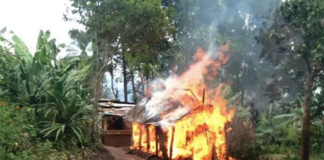 A home destroyed in tribal fighting in PNG's Highlands