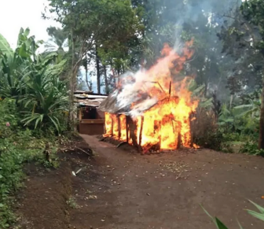 A home destroyed in tribal fighting in PNG's Highlands