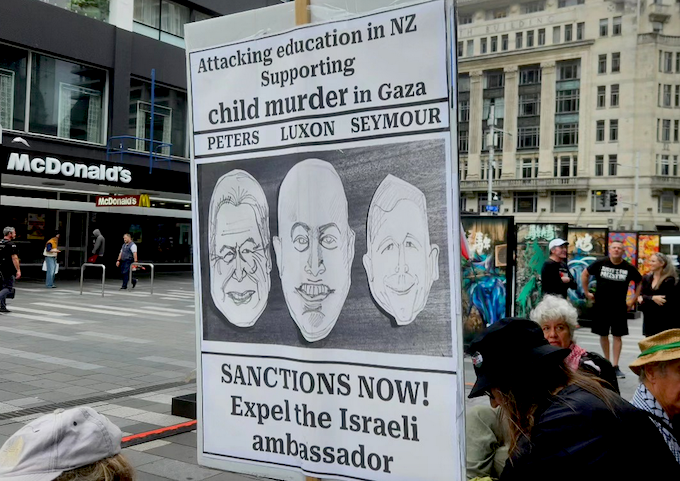 “Sanctions now” placard pictured outside a McDonalds store