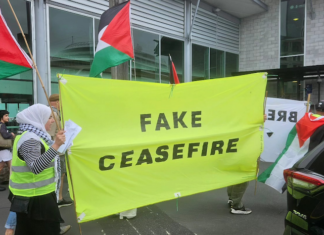 A "Fake Ceasefire" banner at an Auckland protest against the Gaza genocide
