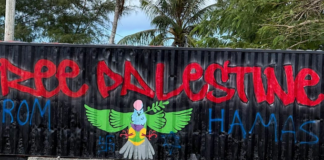 The defaced "Free Palestine" mural in Palau