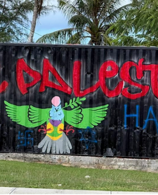 The defaced "Free Palestine" mural in Palau