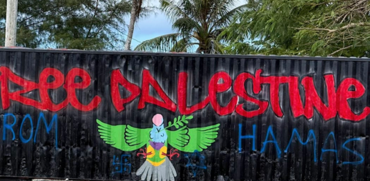 The defaced "Free Palestine" mural in Palau