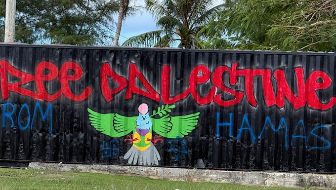 The defaced "Free Palestine" mural in Palau