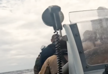 French sailors hunker down in an inflatable