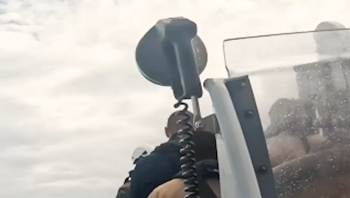 French sailors hunker down in an inflatable