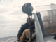 French sailors hunker down in an inflatable