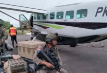 Indonesian soldiers and equipment next to a civilian aircraft in West Papua. Image: ULMWP