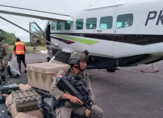 Indonesian soldiers and equipment next to a civilian aircraft in West Papua. Image: ULMWP