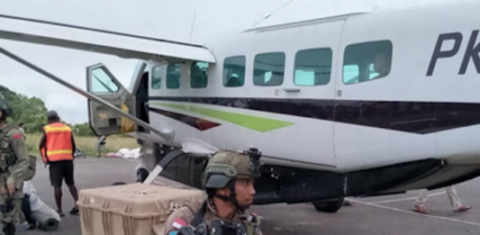 Indonesian soldiers and equipment next to a civilian aircraft in West Papua. Image: ULMWP