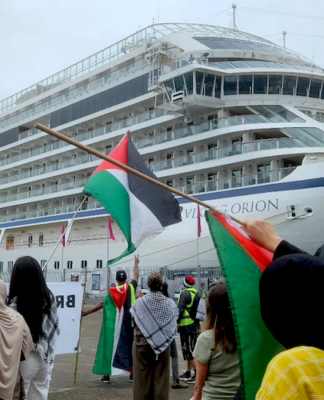Gaza and Rocket Lab protesters on Auckland Tāmaki Makaurau's Queens Wharf