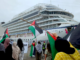 Gaza and Rocket Lab protesters on Auckland Tāmaki Makaurau's Queens Wharf