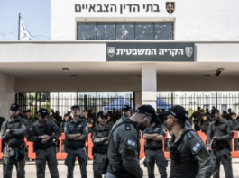 Far-right Israelis and relatives of the soldiers gather in front of a military court building and stage a protest