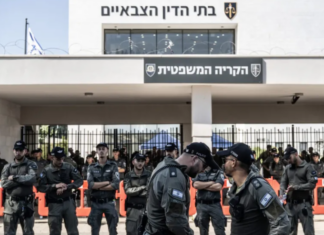 Far-right Israelis and relatives of the soldiers gather in front of a military court building and stage a protest