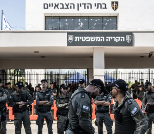 Far-right Israelis and relatives of the soldiers gather in front of a military court building and stage a protest