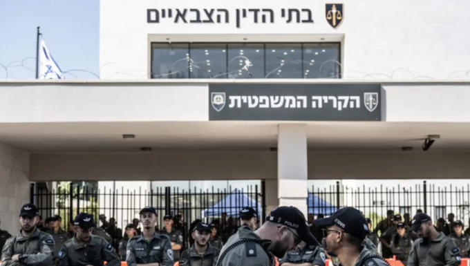Far-right Israelis and relatives of the soldiers gather in front of a military court building and stage a protest